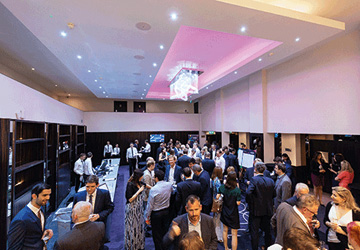 an overview of a lot of people at an award ceremony