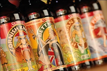 a close up of colourful beer bottle labels 
