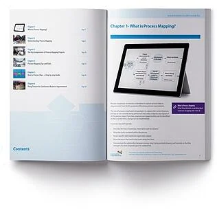 an open book with 'what is process mapping?' and an ipad on the first page 